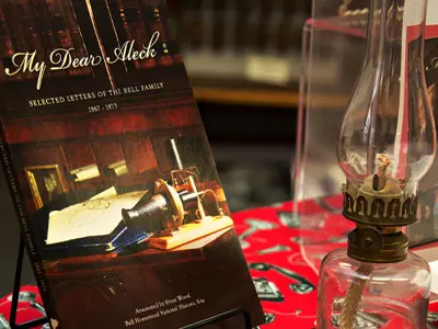 My Deal Aleck book and oil lamp