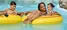 family enjoying a summer afternoon on the lazy river