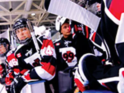 young hockey players changing lines at a game